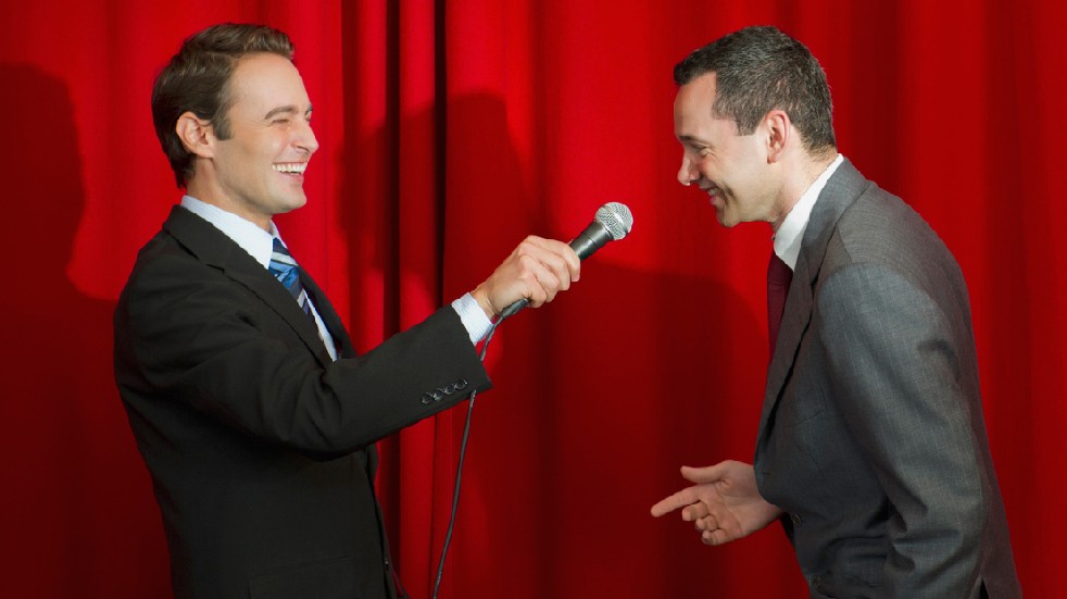 Free events in June two men laughing microphone